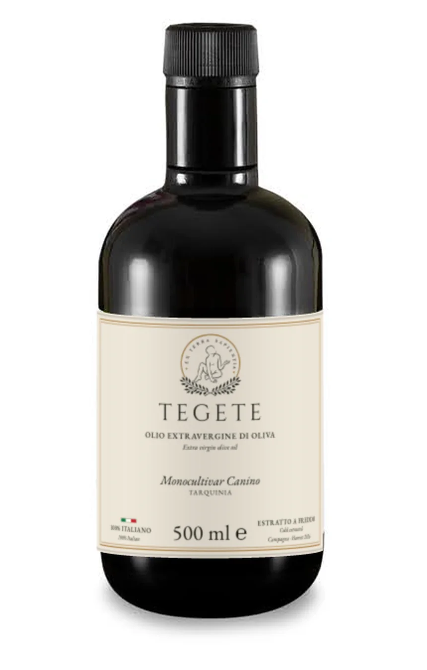 Bottiglia da 500 ml in vetro verde scuro con l'etichetta Tegete color crema
